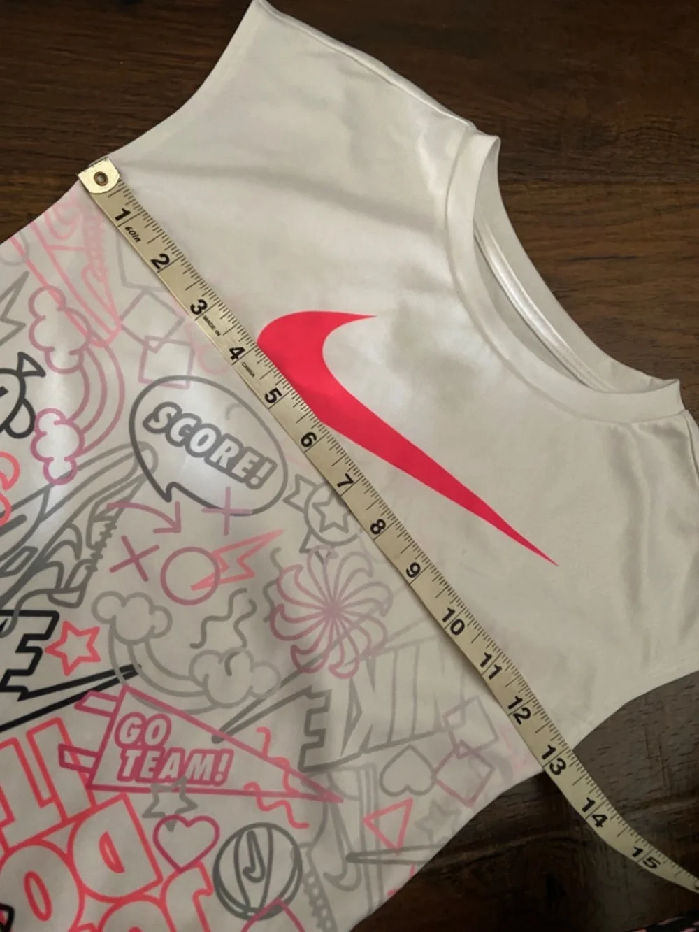 Two Nike t-shirts 5-7yo White pink